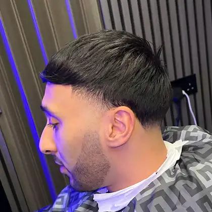 Mid fade with textured crop — mobile barber Leeds